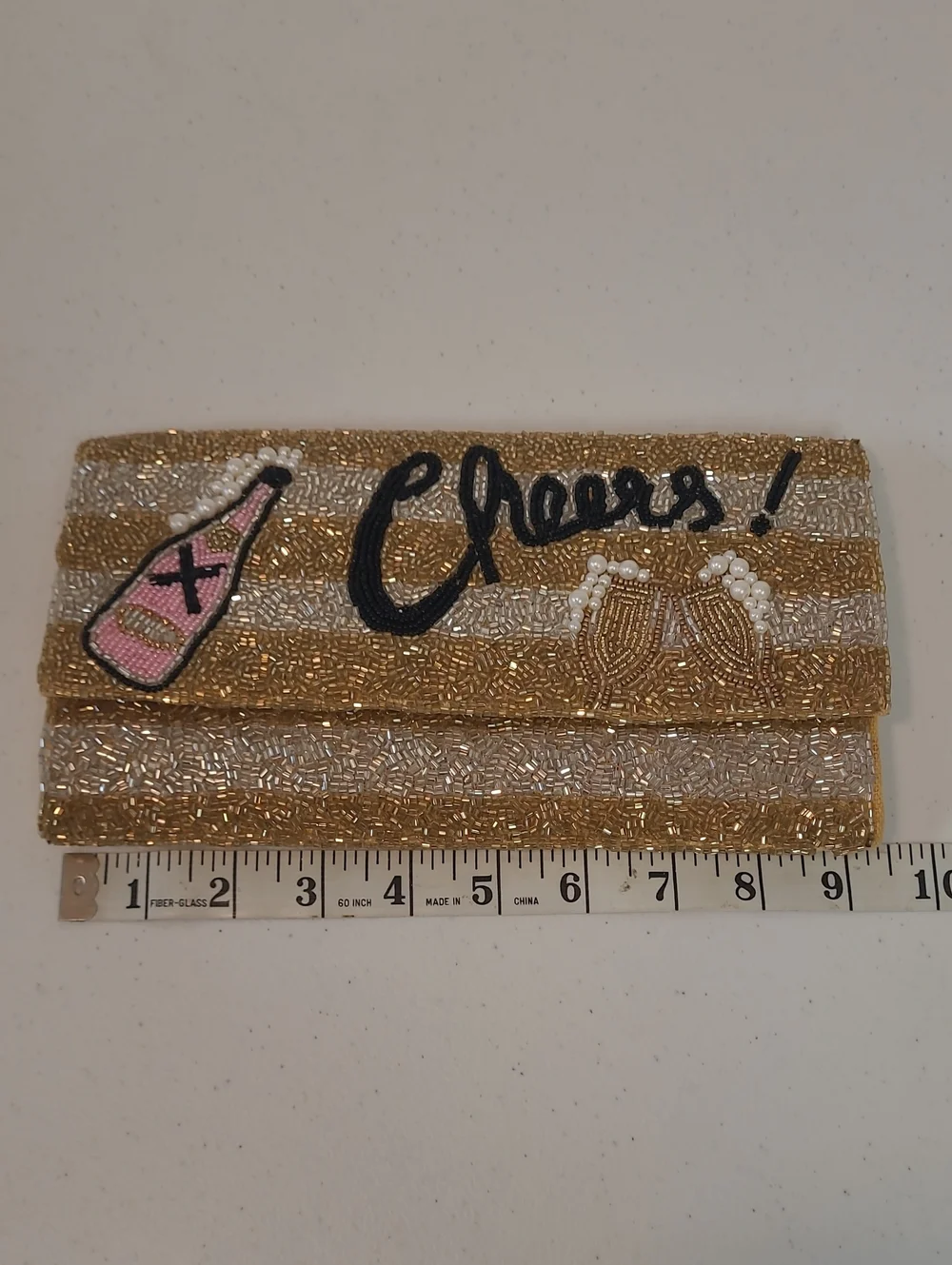 Beaded 'Cheers' Gold and Silver Party Clutch with Pink Bottle and Pearl Accents